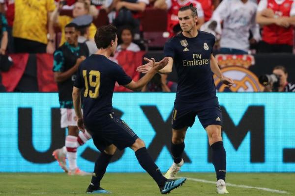 Real Madrid kembali akhirnya memetik kemenangan perdana dalam tur pramusim International Champions Cup (ICC) 2019 melawan Arsenal