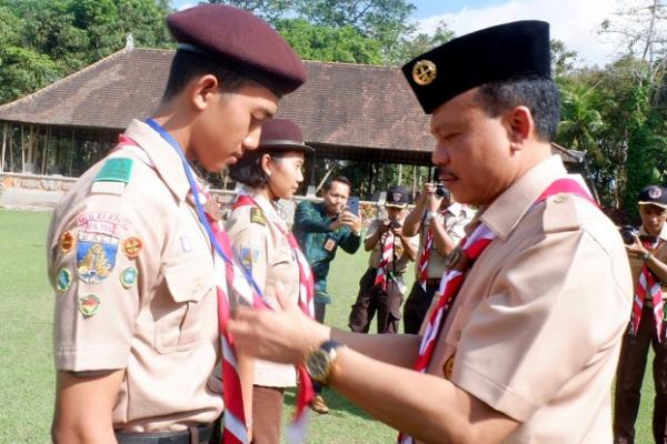 Gubernur Bali yang diwakili Sekretaris Daerah Provinsi Bali Dewa Made Indra membuka Perkemahan Antar Satuan Karya Pramuka (PERANSAKA) Daerah Bali Tahun 2019 di Bumi Perkemahan Margarana, Tabanan, Minggu (28/7).
