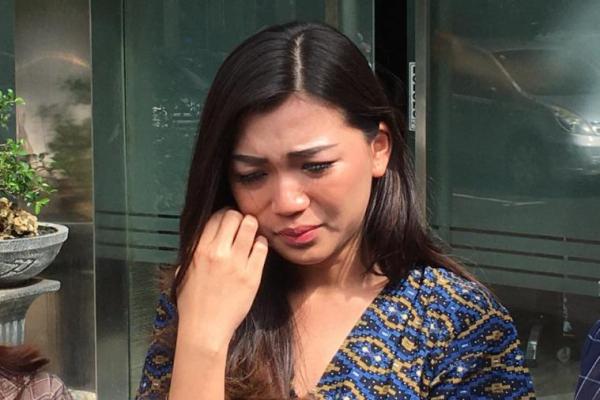Pramugari Garuda Indonesia Cyndyana Lorens yang diperiksa sebagai saksi kasus 