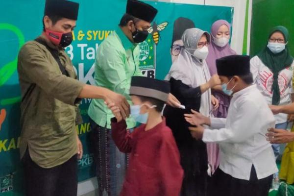 Tangerang menggelar Santunan Anak Yatim dan Khataman Quran secara offline dan online secara serentak 
