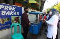 Upaya Ciptakan Lapangan Kerja, Kemnaker Bagikan Bantuan Program TKM ke Pedagang Kaki Lima