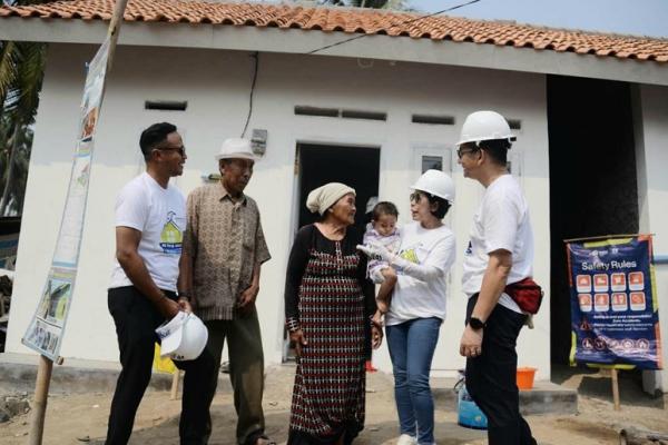 Rumah yang dibangun segenap pekerja ini berada di Kampung Bubulak, Desa Marga Mulya, Mauk, Kabupaten Tangerang, Banten