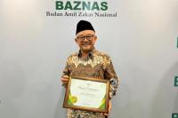 Mendikdasmen Raih Penghargaan Menteri Pendukung Gerakan Zakat